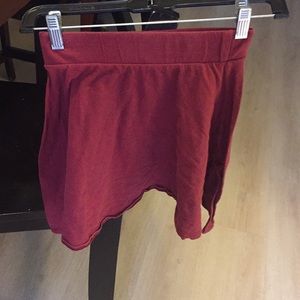 Maroon/ red skirt.